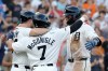 Detroit Tigers' Spencer Torkelson, right, celebrates with Jake Rogers, left, and Kevin McGonigle (7) after hitting a three-run home run against the Athletics during the fifth inning of a baseball game Wednesday, July 8, 2026, in Detroit. (AP Photo/Duane Burleson)