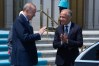 Prime Minister Mark Carney and Turkish President Recep Tayyip Erdogan speak as the prime minister leaves a bilateral meeting in Ankara, Turkey, Tuesday, July 7, 2026. THE CANADIAN PRESS/Adrian Wyld