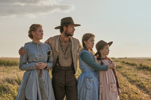 This image released by Netflix shows, from left, Crosby Fitzgerald as Caroline Ingalls, Luke Bracey as Charles Ingalls, Skywalker Hughes as Mary Ingalls, and Alice Halsey as Laura Ingalls in a scene from 
