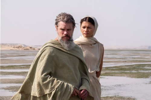 This image released by Universal Pictures shows Matt Damon as Odysseus, left, and Zendaya as Athen, in a scene from 
