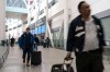 Passengers arrive at Pearson Airport in Mississauga, Ont., Tuesday, March 14, 2023. THE CANADIAN PRESS/Chris Young