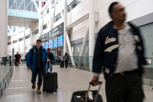 Passengers arrive at Pearson Airport in Mississauga, Ont., Tuesday, March 14, 2023. THE CANADIAN PRESS/Chris Young