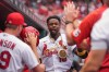 St. Louis Cardinals' Jordan Walker is congratulated by teammates after hitting a two-run home run during the first inning in the first game of a baseball doubleheader against the Milwaukee Brewers Tuesday, July 7, 2026, in St. Louis. (AP Photo/Jeff Roberson)
