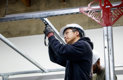 Trainee pipe fitters learn their trade at a union facility in Calgary, Friday, May 15, 2026.THE CANADIAN PRESS/Jeff McIntosh