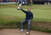 FILE - Jordan Spieth of the United States holds the trophy after winning the British Open Golf Championships at Royal Birkdale, Southport, England, July 23, 2017. (AP Photo/Dave Thompson, File)