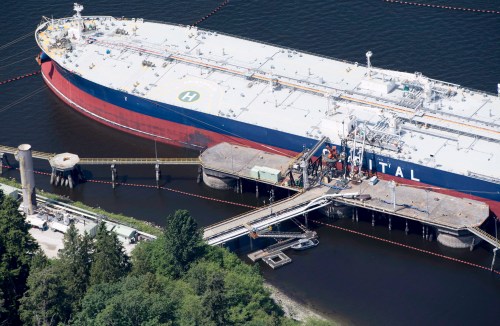 An aerial view of Kinder Morgan's Trans Mountain marine terminal filling an oil tanker in Burnaby, B.C., is shown on Tuesday, May 29, 2018. THE CANADIAN PRESS Jonathan Hayward