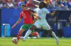 Morocco's Brahim Diaz (10) and France's Jules Kounde (5) fight for the ball during the World Cup quarterfinal soccer match between France and Morocco in Foxborough, Mass., near Boston, Thursday, July 9, 2026. (AP Photo/Steven Senne)