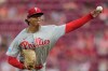 Philadelphia Phillies pitcher Jesús Luzardo throws during the first inning of a baseball game against the Cincinnati Reds in Cincinnati, Thursday, July 9, 2026. (AP Photo/Carolyn Kaster)