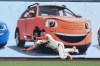 San Francisco Giants left fielder Victor Bericoto dives to catch a fly out hit by Colorado Rockies' Cole Carrigg during the first inning of a baseball game Thursday, July 9, 2026, in San Francisco. (AP Photo/Jeff Chiu)
