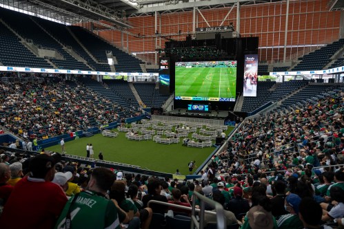 Spectators watch the opening match of the World Cup soccer tournament between Mexico and South Africa, Thursday, June 11, 2026, at the USTA Billie Jean King National Tennis Center in New York. (AP Photo/Yuki Iwamura)
