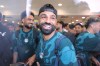 Mohamed Salah, smiles as he is greeted by fans upon the Egyptian national soccer team arrival at El-Alamein airport, 160 km (99 miles) west of Alexandria, Egypt, Friday, July 10, 2026. (AP Photo)