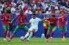 France's Kylian Mbappe (10) makes a pass as Morocco's Issa Diop (14) and Neil El Aynaoui, right, defend during the World Cup quarterfinal soccer match between France and Morocco in Foxborough, Mass., near Boston, Thursday, July 9, 2026. (AP Photo/Stephanie Scarbrough)