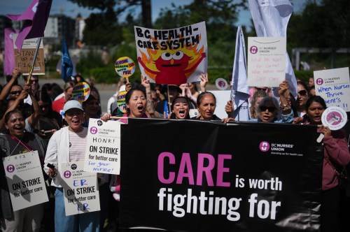 Members of the BC Nurses' Union picket outside Surrey Memorial Hospital, in Surrey, B.C., Thursday, July 9, 2026. THE CANADIAN PRESS/Darryl Dyck