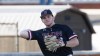 Elon's Ryan Sprock (13) makes a throw during an NCAA baseball game on Tuesday, Feb. 25, 2025, in Winston-Salem, N.C. (AP Photo/Ben McKeown)