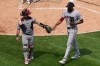 Boston Red Sox relief pitcher Tyron Guerrero, right, celebrates with catcher Connor Wong, left, after fifth inning of a baseball game against the Chicago White Sox in Chicago, Thursday, July 9, 2026. (AP Photo/Nam Y. Huh)
