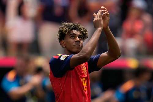 Spain's Lamine Yamal (19) celebrates at the end of the World Cup quarterfinal soccer match between Spain and Belgium in Inglewood, Calif., near Los Angeles, Friday, July 10, 2026. (AP Photo/Gregory Bull)