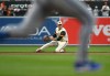 Baltimore Orioles shortstop Gunnar Henderson fields a grounder before turning a double play on a ball hit by Kansas City Royals' Nick Loftin, not pictured, during the second inning of a baseball game, Friday, July 10, 2026, in Baltimore. (AP Photo/Steve Ruark)
