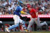 Los Angeles Angels catcher Tyler Heineman scores on a sacrifice fly hit by Vaughn Grissom as Minnesota Twins catcher Ryan Jeffers attempts to field the ball during the fifth inning of a baseball game, Friday, July 10, 2026, in Minneapolis. (AP Photo/Matt Krohn)