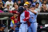 Toronto Blue Jays' Brandon Valenzuela, right, puts a home run jacket on Kazuma Okamoto, left, after Okamoto hit a three-run home run against the San Diego Padres in the fifth inning of a baseball game Friday, July 10, 2026, in San Diego. (AP Photo/Derrick Tuskan)
