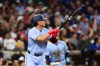 Toronto Blue Jays' Kazuma Okamoto watches his three-run home run against the Toronto Blue Jays in the fifth inning of a baseball game Friday, July 10, 2026, in San Diego. (AP Photo/Derrick Tuskan)