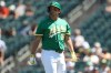 Athletics' Nick Kurtz walks to the dugout after striking out during the fourth inning of a baseball game against the Miami Marlins, Sunday, July 5, 2026, in West Sacramento, Calif. (AP Photo/Scott Marshall)
