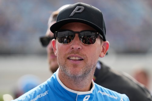 Denny Hamlin looks around before the start of a NASCAR Cup Series auto race at Chicagoland Speedway in Joliet, Ill., Sunday, July 5, 2026. (AP Photo/Nam Y. Huh)