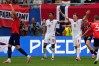 Norway's Erling Haaland (9), England's Jude Bellingham (10) and England's Elliot Anderson (8) react after Norway's Torbjoern Heggem (17) scored a goal that was disallowed during the World Cup quarterfinal soccer match between Norway and England in Miami Gardens, Fla., Saturday, July 11, 2026. (AP Photo/Chris Carlson)