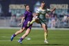 Vancouver Rise's Josie Longhurst, front right, and Calgary Wild's Meggie Dougherty Howard vie for the ball during the first half of an NSL soccer match, in Burnaby, B.C., on Saturday, May 24, 2025. THE CANADIAN PRESS/Darryl Dyck