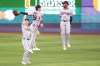 Cleveland Guardians center fielder Petey Halpin, left; left fielder Steven Kwan (38) and right fielder Kahlil Watson celebrate winning a baseball game against the Miami Marlins, Saturday, July 11, 2026, in Miami. (AP Photo/Jim Rassol)