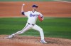 Texas Rangers pitcher Chris Martin throws to the Los Angeles Angels during the seventh inning of a baseball game, Tuesday, July 7, 2026, in Arlington, Texas. (AP Photo/Julio Cortez)