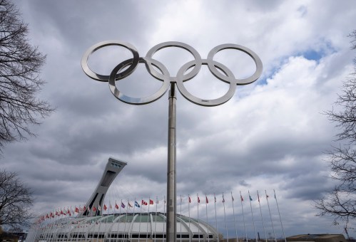 The Olympic rings are displayed outside Olympic Stadium in Montreal on Monday, May 4, 2026. THE CANADIAN PRESS/Christinne Muschi