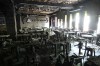 In this handout photo released by Bangkok Metropolitan Administration, the interior of a beer bar is seen after a fire in Bangkok, Thailand, Monday, July 13, 2026. (Bangkok Metropolitan Administration via AP)