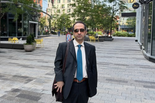 Iranian American defendant Mahdi Mohammad Sadeghi poses for a photo Friday, July 10, 2026, before heading into federal court in Boston. (AP Photo/Michael Casey)