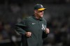 FILE - Oakland Athletics pitching coach Scott Emerson jogs during a baseball game against the Toronto Blue Jays in Oakland, Calif., Sept. 5, 2023. (AP Photo/Jeff Chiu, File)