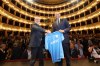 The new SSC Napoli coach, Massimiliano Allegri, right, holds a club's jersey with club president Aurelio De Laurentiis, during a presentation press conference at the San Carlo Theater, in Naples, Italy, Tuesday, July 14, 2026. (Alessandro Garofalo/LaPresse via AP)