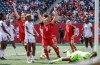 Canada's Desiree Scott (11) celebrates Shelina Zadorsky's (4) goal against Haiti during second half soccer action in Winnipeg, Saturday, May 31, 2025. THE CANADIAN PRESS/John Woods