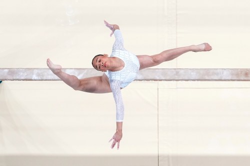 FILE - Suni Lee, of the United States, performs on the beam during the women's artistic gymnastics individual balance beam finals in Bercy Arena during the 2024 Summer Olympics, Aug. 5, 2024, in Paris. (AP Photo/Morry Gash, File)