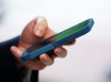 A person uses a cellphone in Ottawa on Monday, July 18, 2022. THE CANADIAN PRESS/Sean Kilpatrick