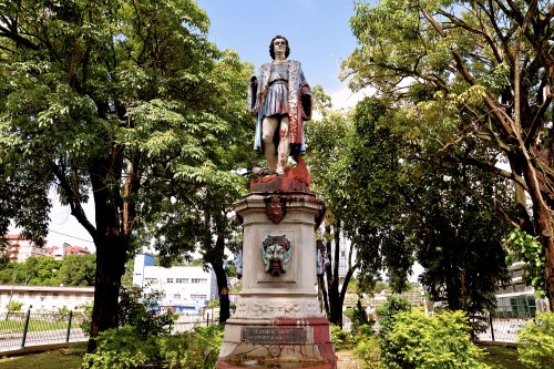 FILE - A vandalized statue of Christopher Columbus towers over Columbus Square in Port of Spain, Trinidad and Tobago, on Aug. 28, 2024. (AP Photo/Robert Taylor, File)