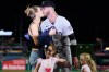 New York Yankees' Cody Bellinger kisses Chase Carter Bellinger after he won the MVP trophy after the MLB baseball All-Star Game between the American League and National League, Tuesday, July 14, 2026, in Philadelphia. (AP Photo/Matt Slocum)