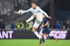 FILE -Marseille's Mason Greenwood controls the ball in the air during the French League One soccer match between Marseille and Paris Saint-Germain at Orange Velodrome in Marseille, France, Sept. 22, 2025. (AP Photo/Philippe Magoni, File)