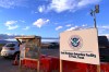 FILE - A sign marks the entrance to a series of hardened tents at the Camp East Montana immigrant detention center in the desert at a U.S. Army base on the outskirts of El Paso, Texas, Feb. 13, 2026. (AP Photo/Morgan Lee, File)