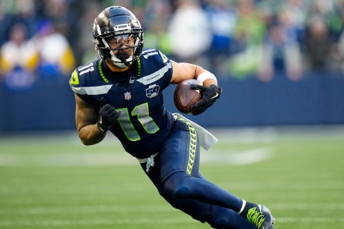 FILE - Seattle Seahawks wide receiver Jaxon Smith-Njigba (11) runs with the ball during the NFC Championship NFL football game Jan. 25, 2026, in Seattle. (AP Photo/Ben VanHouten, File)
