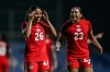 Canada's Marie Yasmine Alidou, left, celebrates after scoring during the international women's friendly soccer match between Canada and South Korea at the Pinatar Arena Football Center in Murcia, Spain, on Tuesday, Dec. 3, 2024. (AP Photo/Francisco Macia Martinez)