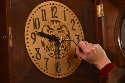FILE - Bethany Gill winds a clock in the Pennsylvania Supreme Court chamber, Dec. 13, 2024, in Harrisburg, Pa. (AP Photo/Marc Levy, File)