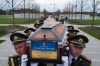FILE - An honor guard carries the coffins of unidentified Ukrainian soldiers killed in battle during the Russian-Ukrainian war at a funeral ceremony at a military cemetery near Kyiv, Ukraine, April 30, 2026. (AP Photo/Evgeniy Maloletka, File)