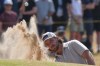 Tommy Fleetwood of England plays out of a bunker on the 4th green during the first day of the British Open Golf championships at Royal Birkdale golf club, in Southport, England, Thursday, July 16, 2026. (AP Photo/Jon Super)