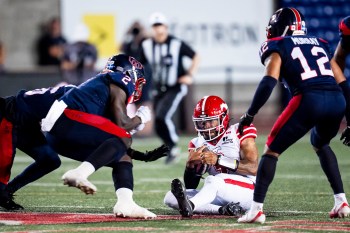 Calgary Stampeders quarterback Vernon Adams Jr. (3) slides during CFL football action against Montreal Alouettes in Montreal on Saturday, July 11, 2026. THE CANADIAN PRESS/Christopher Katsarov