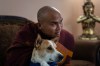 Bhikkhu Pannakara, a Buddhist monk who led a Walk for Peace from Fort Worth, Texas, to Washington, D.C., sits with his dog, Aloka, before an event at Wat Thai of Los Angeles in the North Hollywood section of Los Angeles, Monday, July 13, 2026. (AP Photo/Jae C. Hong)