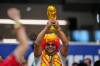 A fan of Spain holds up a replica of the World Cup trophy before the World Cup round of 16 soccer match against Portugal in Arlington, Texas, near Dallas, Monday, July 6, 2026. (AP Photo/Ashley Landis)